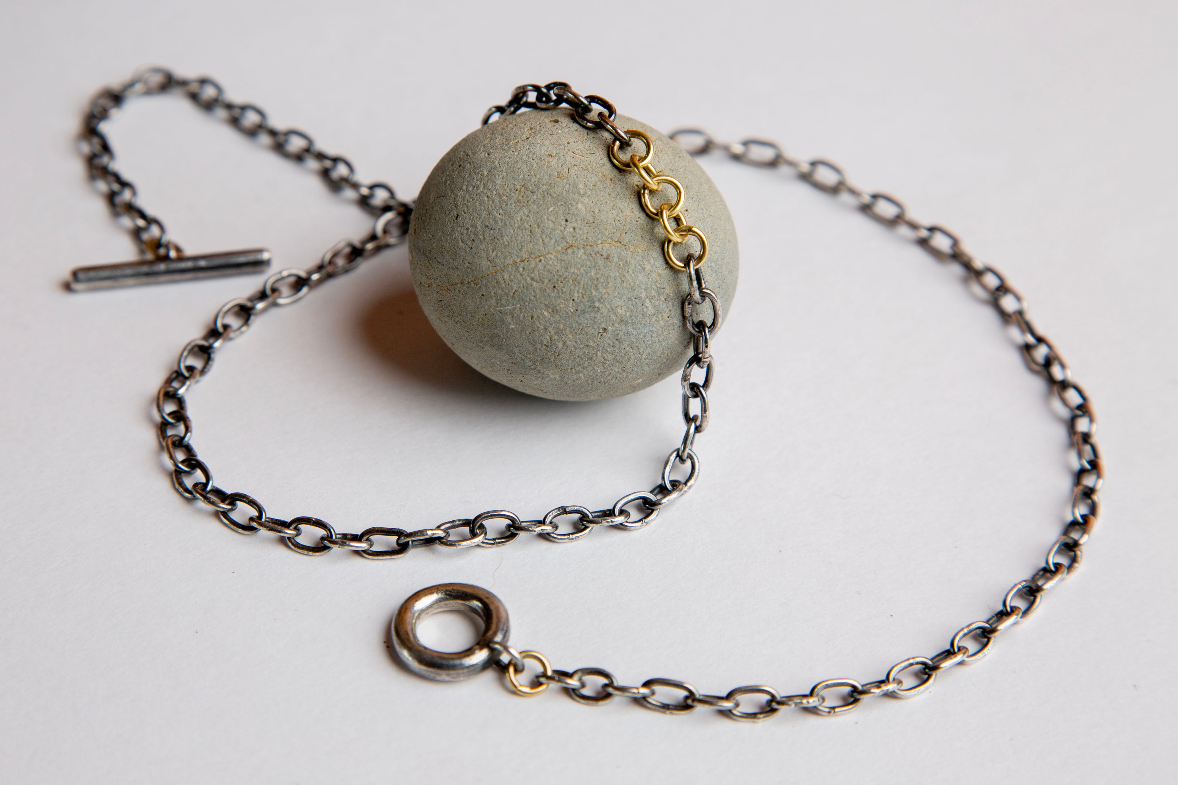 Mixed metal chain