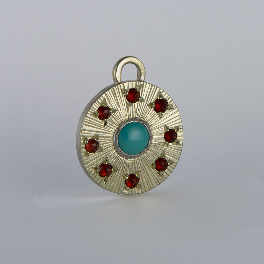 Turquoise and garnet starburst pendant