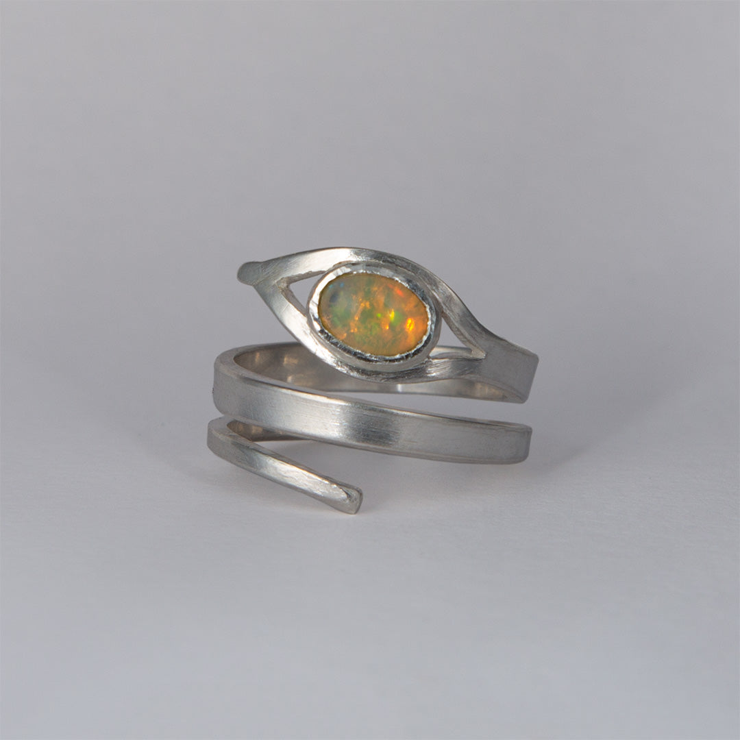 Eye-of-opal snake ring