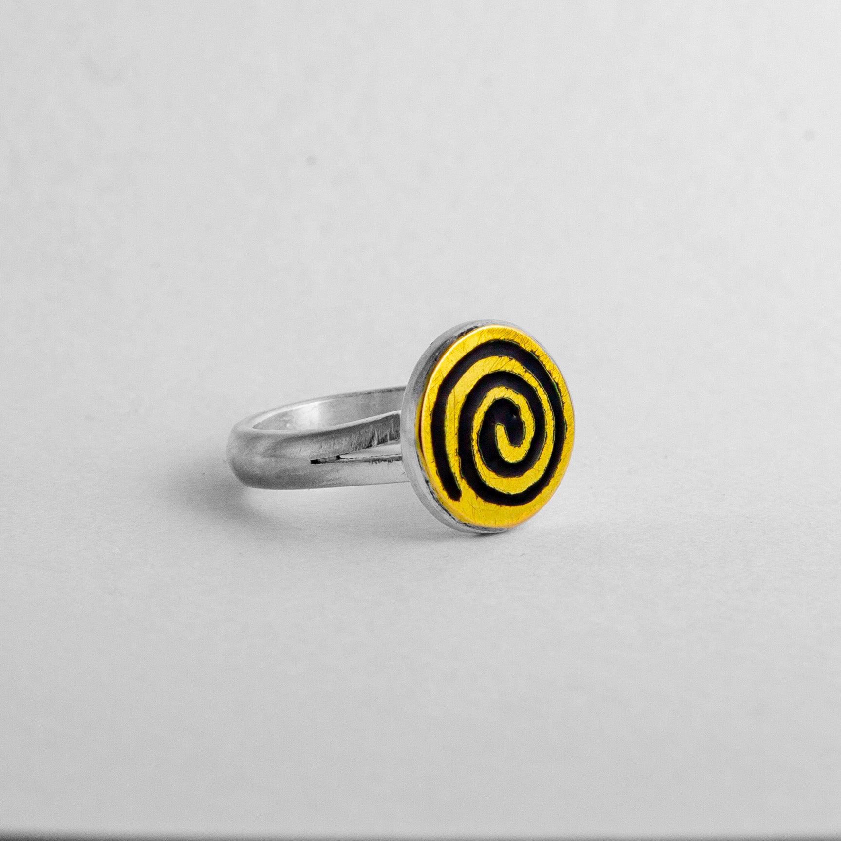 Mixed metal and enamel spiral ring