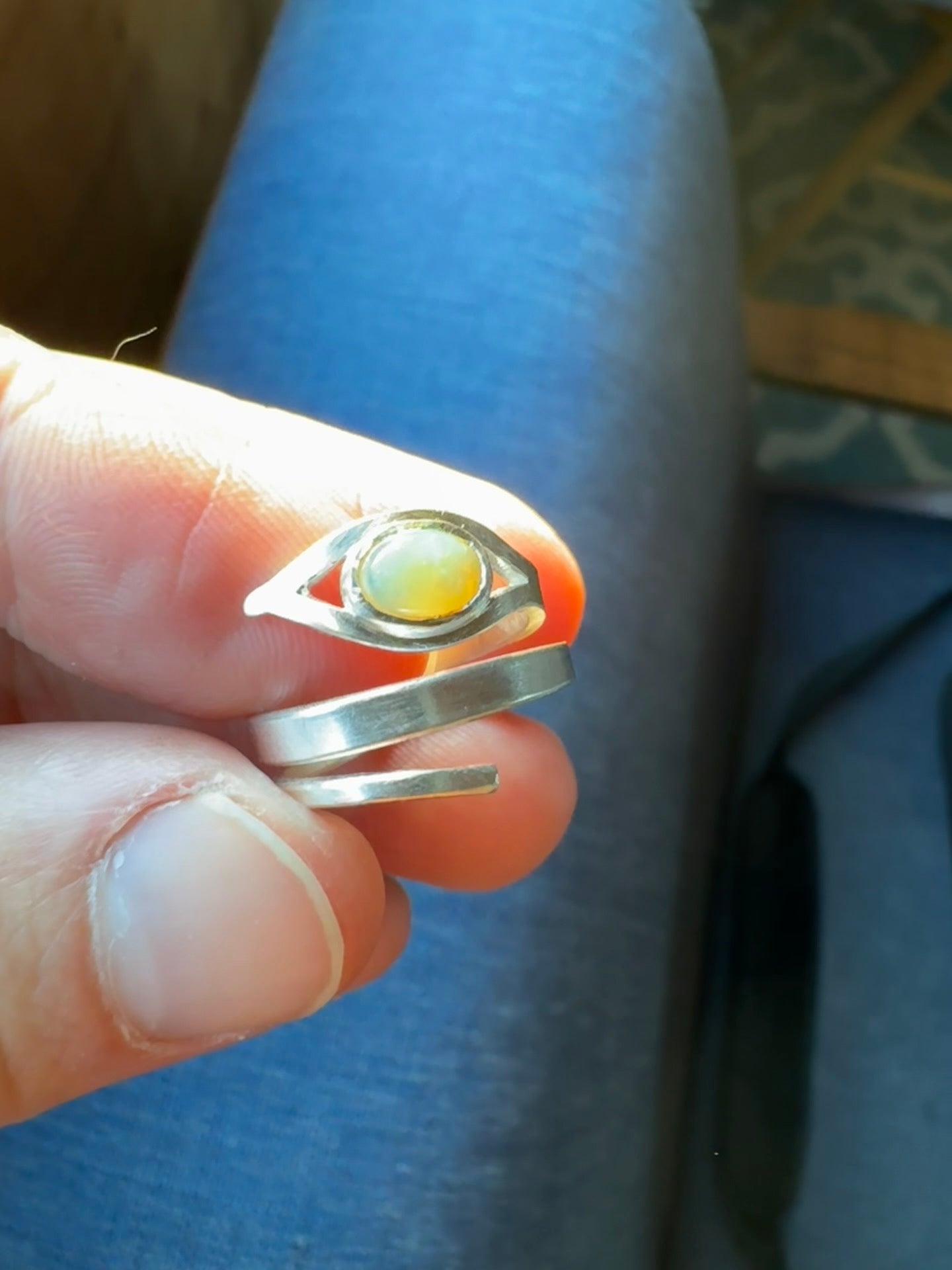 Eye-of-opal snake ring